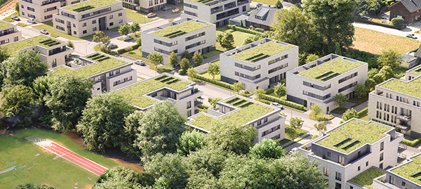 Luftaufnahme des AVENIA Quartiers mit mehreren Wohngebäuden und Grünflächen