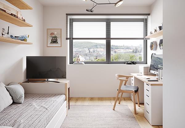 Helles Zimmer mit Schreibtisch und Bett in einer AVENIA Wohnung