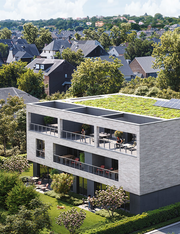 Außenansicht eines modernen Wohngebäudes im AVENIA Quartier mit begrüntem Dach